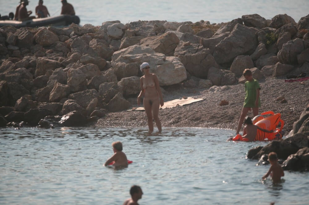 FKK cove pyramid in waters - The naked body as a reflection of inner beauty