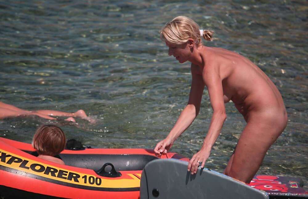 Red Boating for Two Nudists pics - Where nudism is commonplace