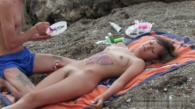 Naked body art on the beach Full HD video - A defining feature of naturism is the absence of clothing