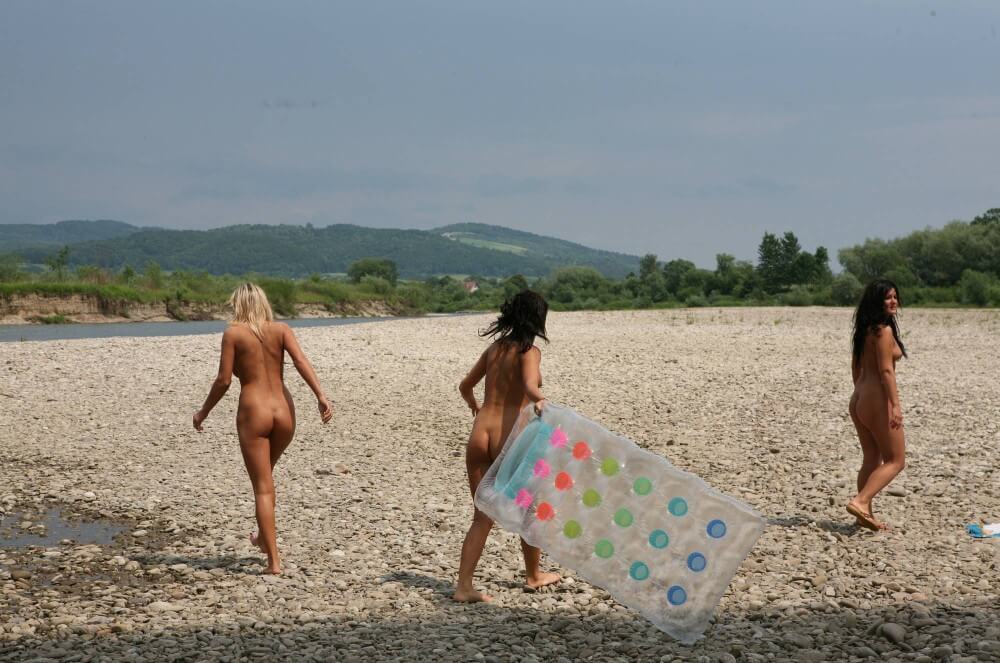 Naturist Park Floating On River photos - Nudity helps one better understand oneself and the surrounding world