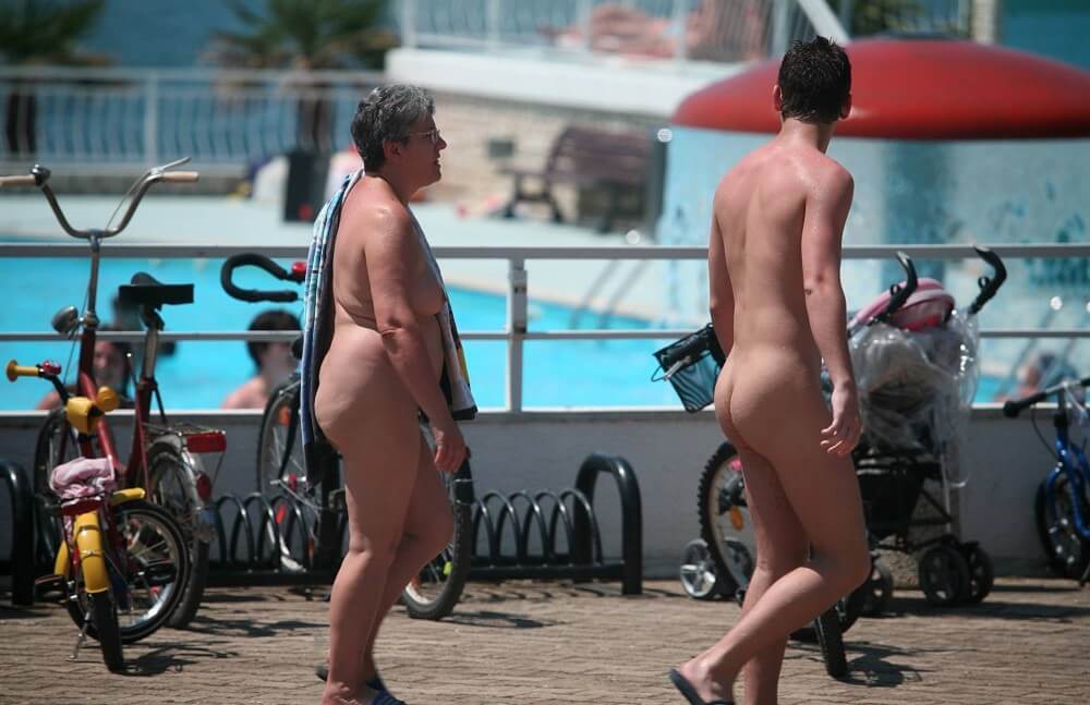 Sun-Soaked Sidewalk pics - The idea of freedom and self-acceptance, as embodied by Adam and Eve, is important