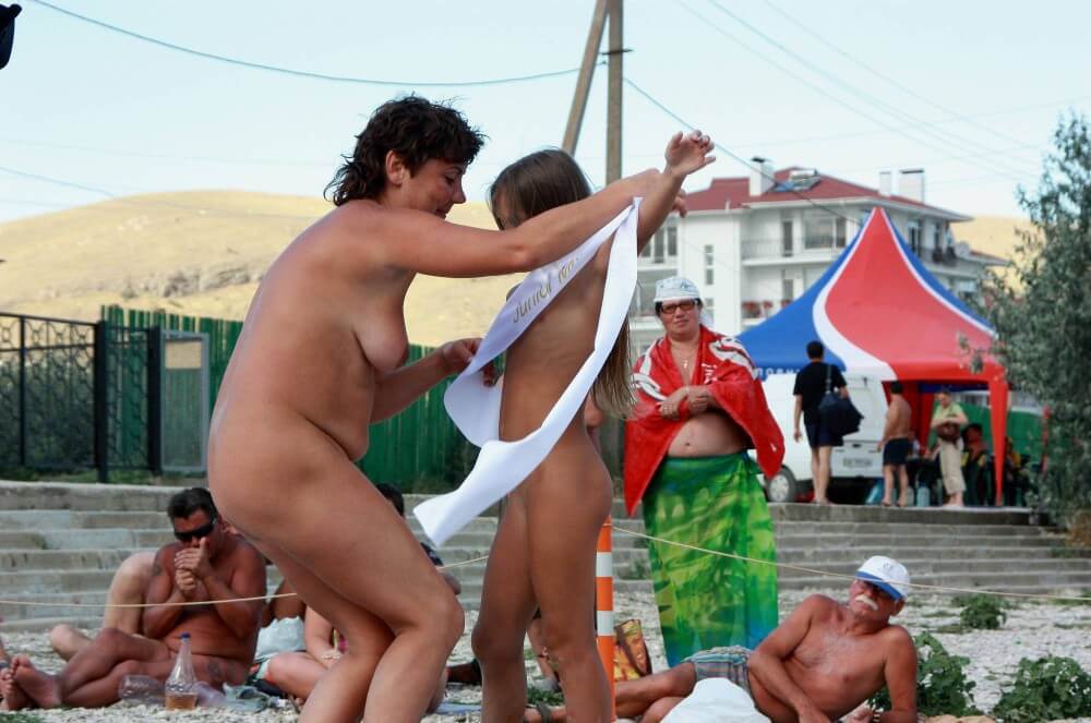 Presenting Mini Awards photos - The practice of naturism fosters an atmosphere of trust and respect