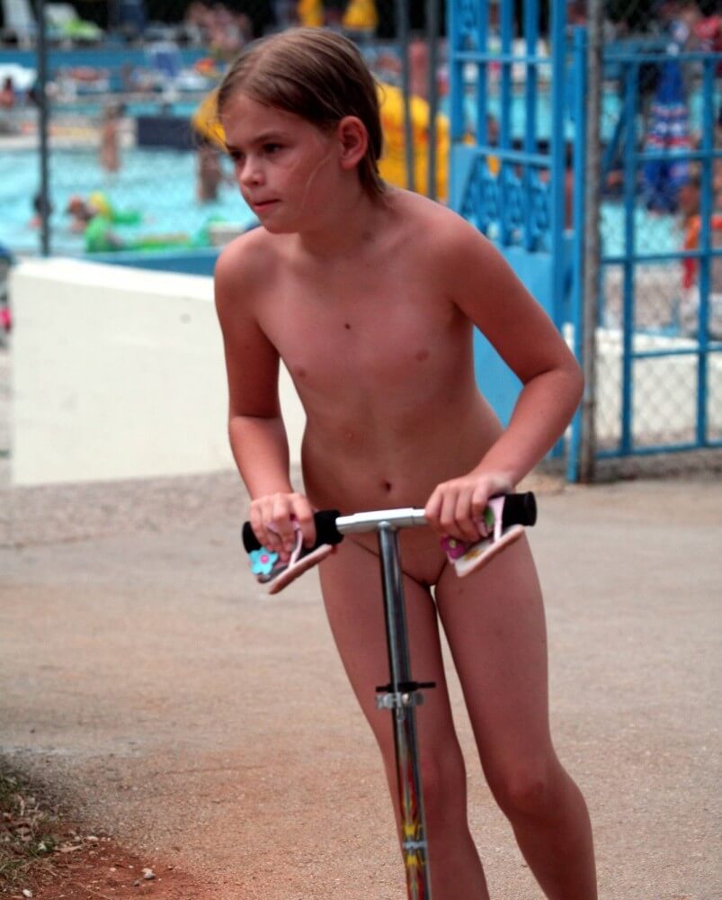 Pool-Side Naturist Scooter pics - Naturists value a simple life
