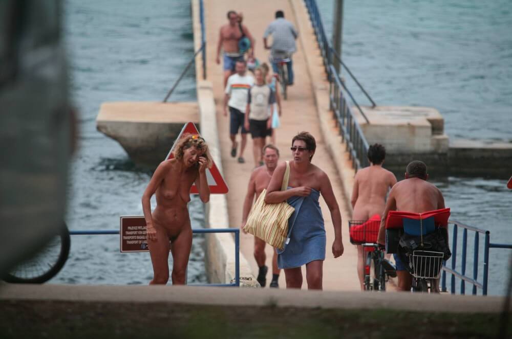 Crete FKK Bridge Crossing photos - A nudist values the connection with nature and the human body
