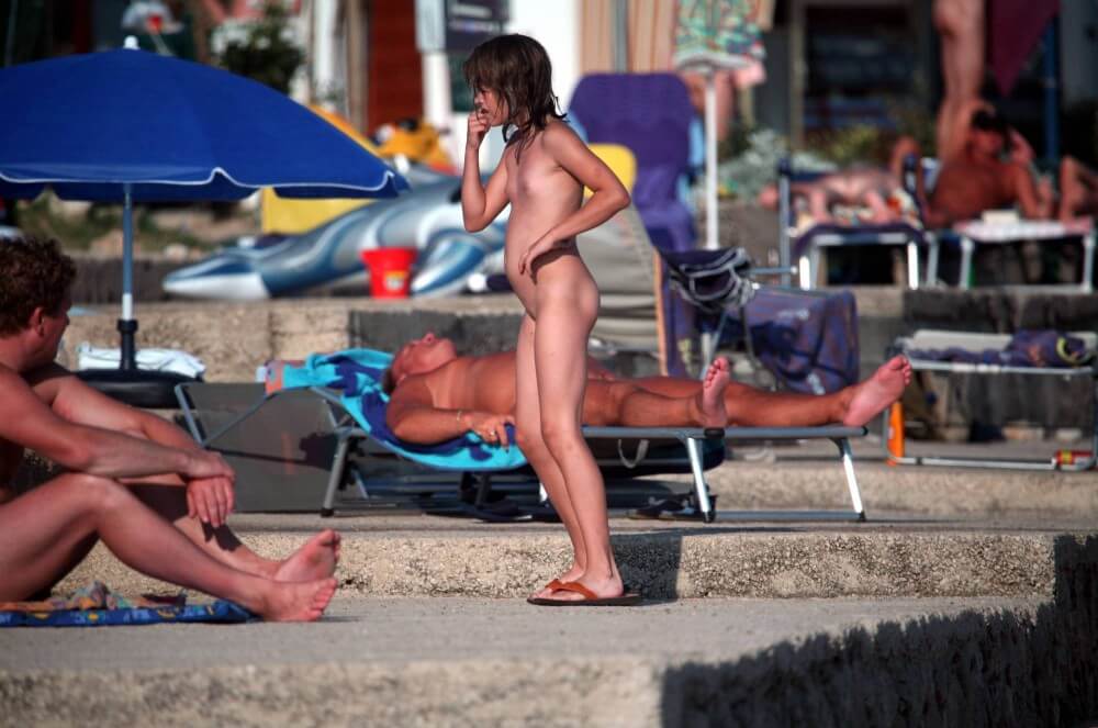 Girl Walk to Nudist Shower pics - A nude person strives for inner harmony and peace of mind